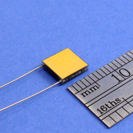 image of gold plated TEC mini micro module part # 03101-9B30-30RU7 shown next to ruler for scale