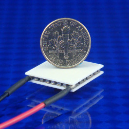picture of TEC Peltier cooler part number 03111-5P31-12CG shown with USA Dime 10 cent coin for scale