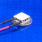 image of mini micro peltier TEC cooler module 00711-5L31-06CB shown sitting on USA Dime 10 cent coin for scale
