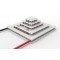 Close up image of  5 stage thermoelectric module 25415-5L30-65CQB with a 40x40mm bottom face and a 10x10mm top cold face