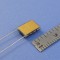 image of rectangular TEC mini micro module part # 02301-9A30-11RU6A shown next to ruler for scale