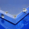 Iso closeup view of recessed screw heads on an aluminum liquid cooling plate